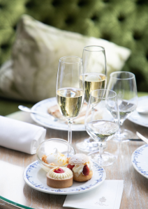 post-wedding-brunch-table-champagne-individual-pastries-outdoor-elegant-setting