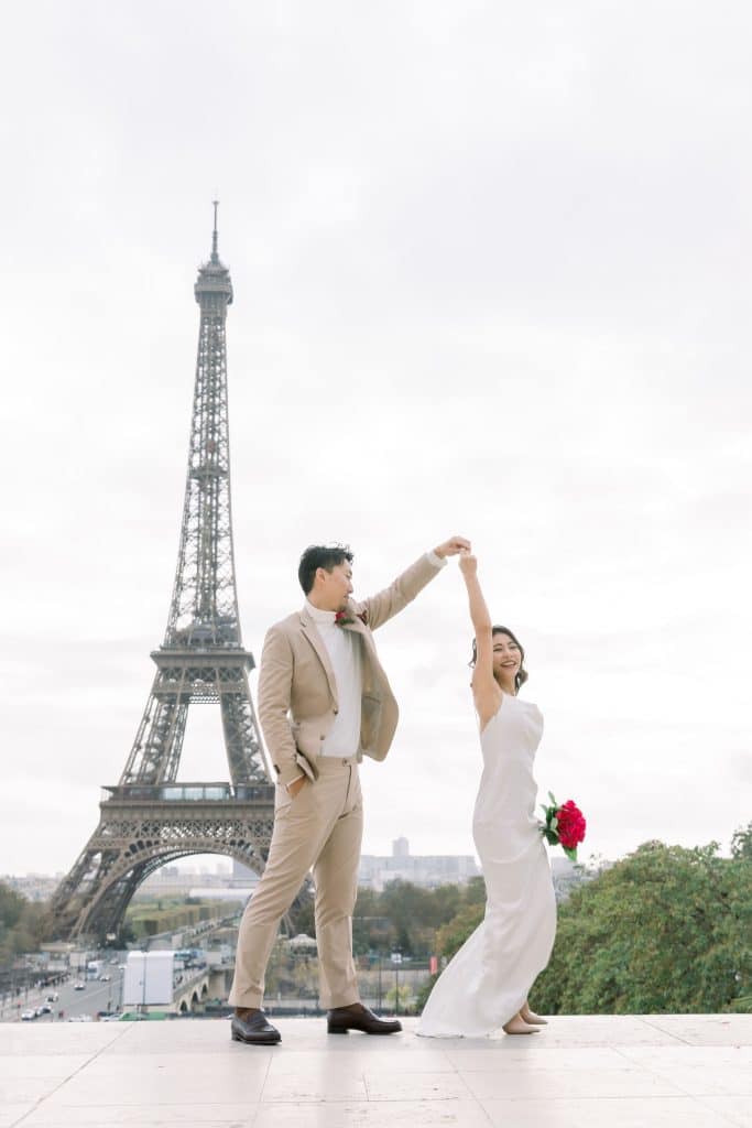 a dance in front of the Eiffel tower